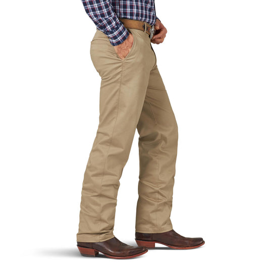 Men's khaki western pants with brown belt and cowboy boots, side view
