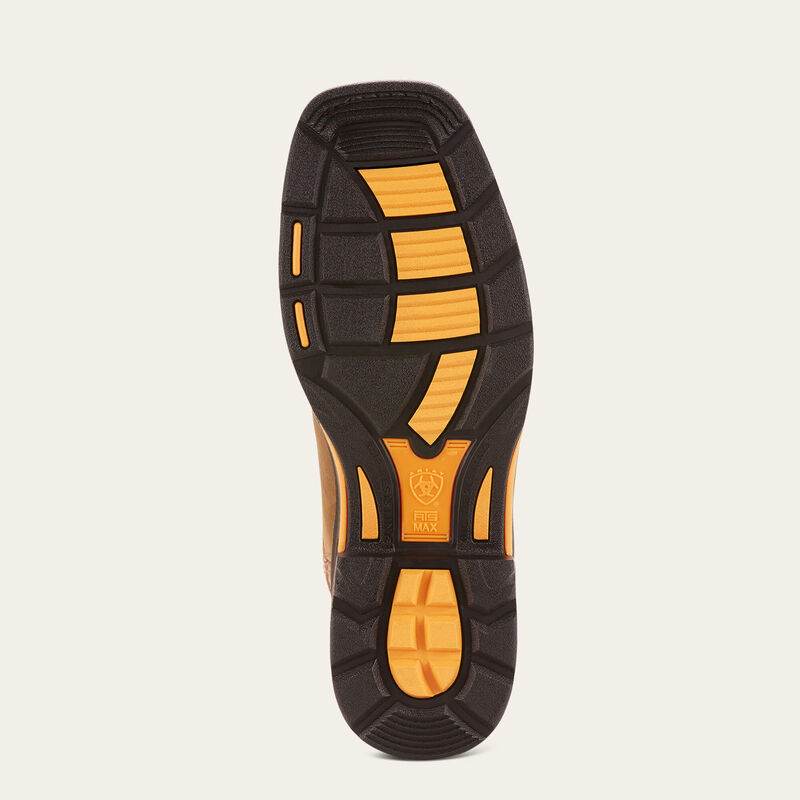 Non-slip black and yellow work boot sole with tread pattern and safety markings