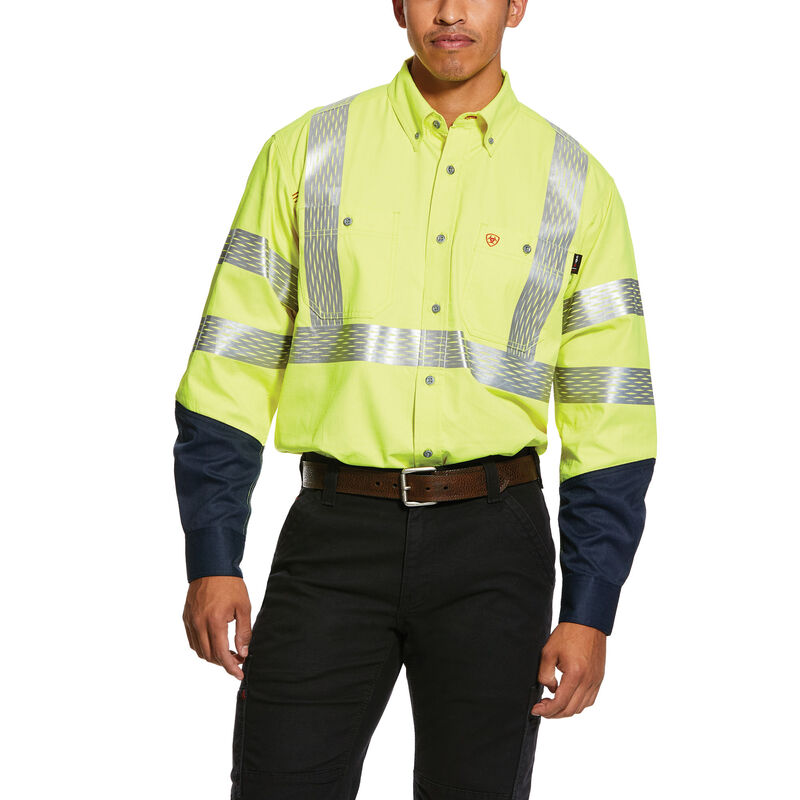 Person wearing a high-visibility safety shirt with reflective stripes on a white background