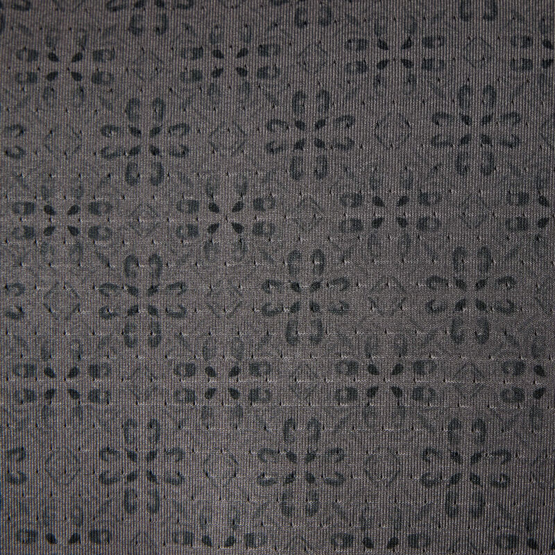 Close-up of a textured gray fabric with a subtle pattern