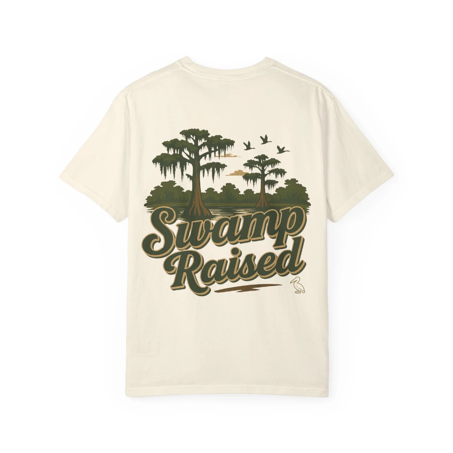 Beige t-shirt with 'Swamp Raised' graphic design on a white background