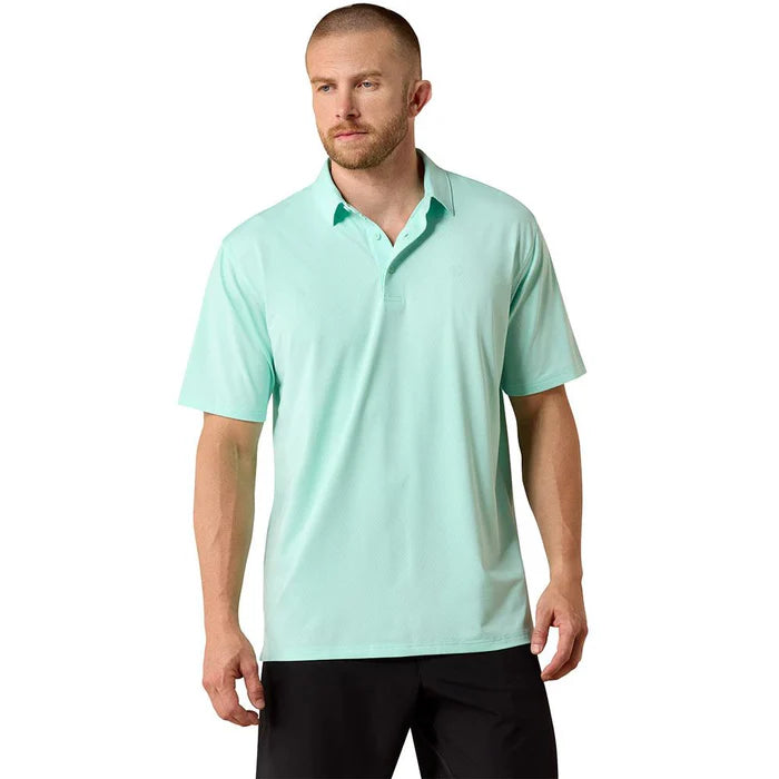 Man wearing light green short sleeve polo shirt and black pants