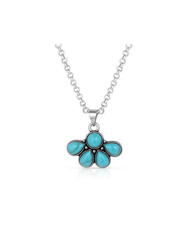 Silver chain necklace with turquoise floral pendant, boho jewelry style