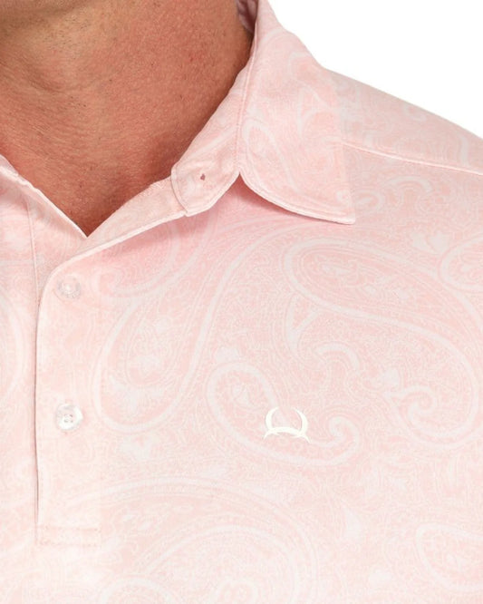 Light pink paisley polo shirt with button collar and subtle embroidered logo