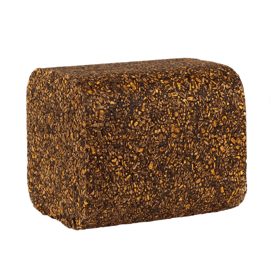 A rectangular, thick-walled cushion or foam block with rounded corners, covered in a dense, textured pattern of dark brown and golden-brown flecks, isolated on a solid white background.