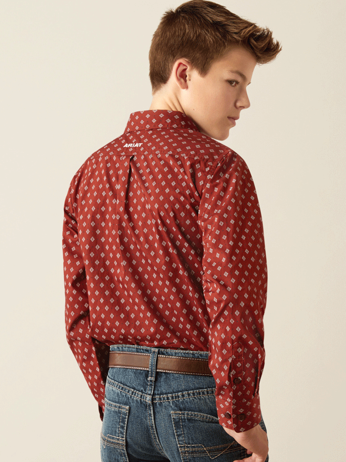 Boy in red diamond print button-up shirt and blue jeans, western casual outfit