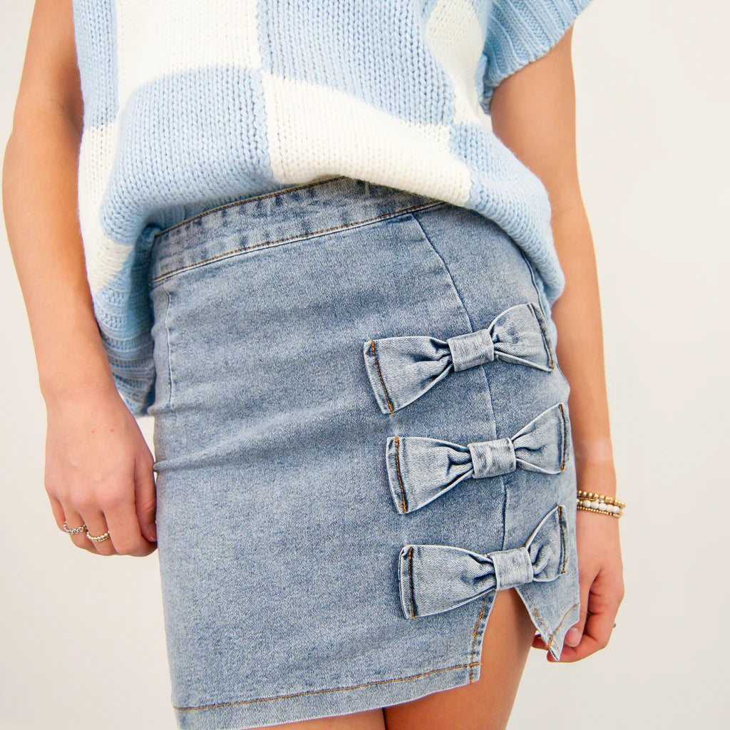 DENIM MINI SKIRT WITH BOW TRIM