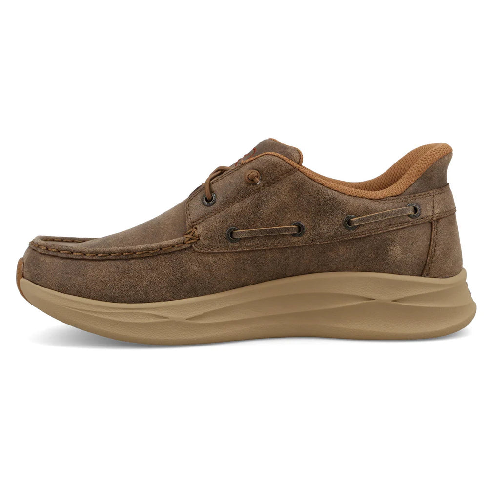 Brown leather shoe with tan sole on a white background