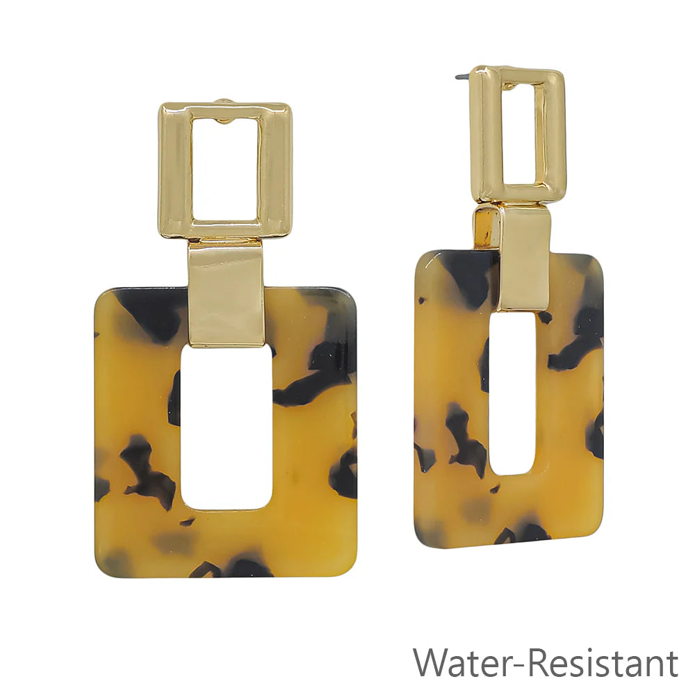 Gold and tortoiseshell rectangular drop earrings, water-resistant, on white background