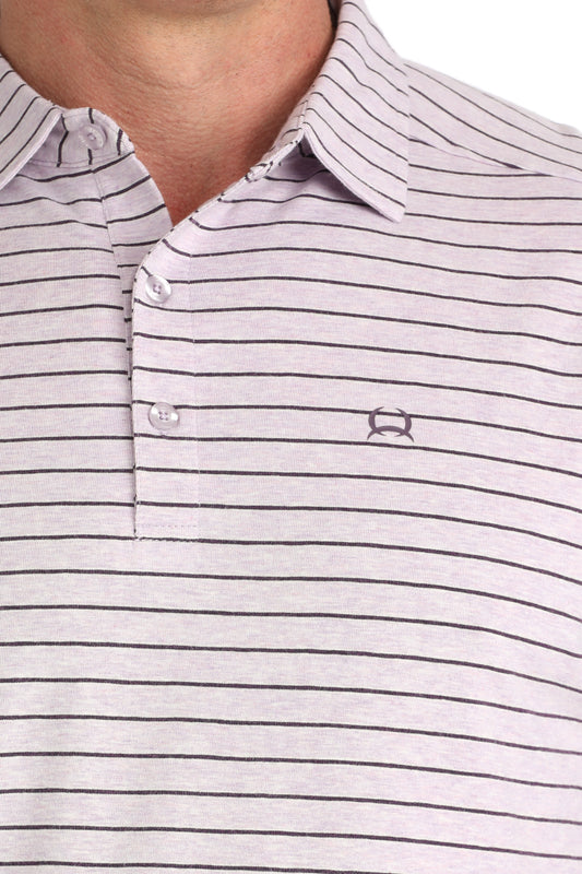 Close-up of a striped polo shirt with a brand logo on a white background