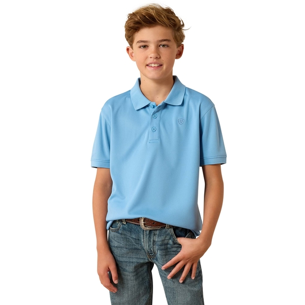 Boy wearing a blissful blue short sleeve polo shirt and jeans