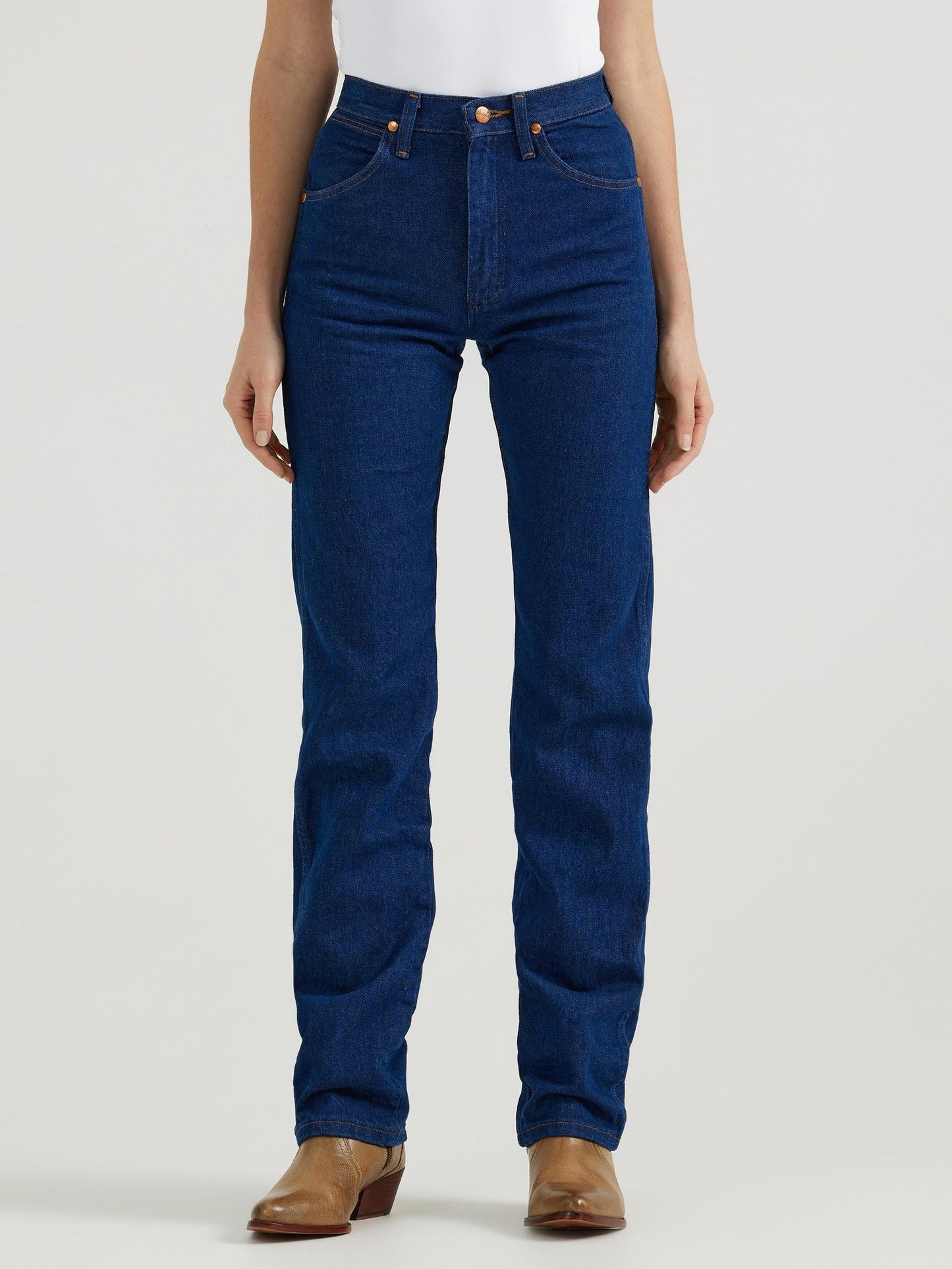 Women in dark jeans white shirt