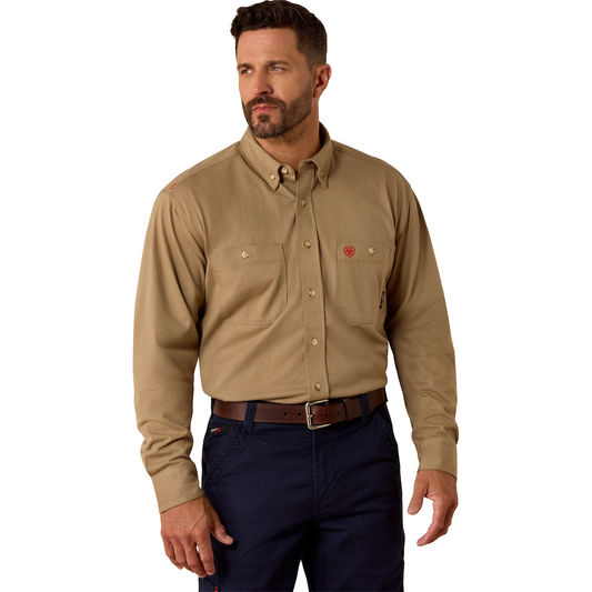 Man wearing a beige shirt with a logo on a white background