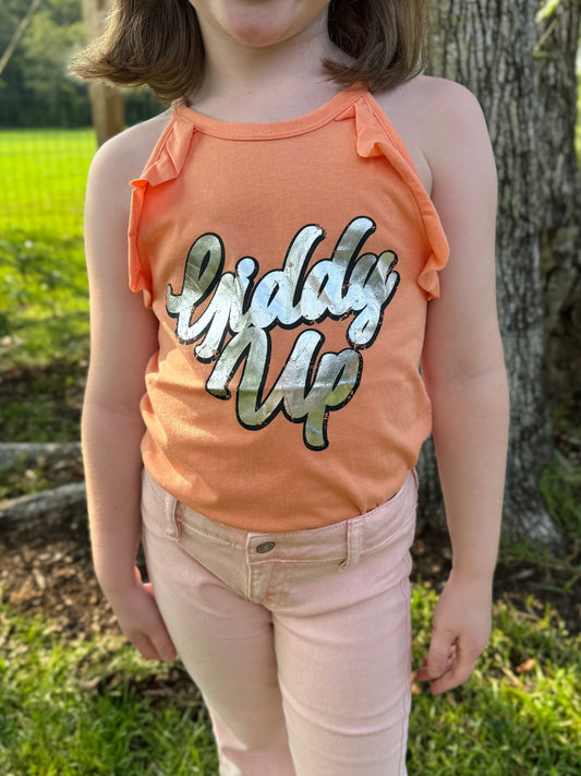 Child wearing an orange tank top with 'Giddy Up' text, standing outdoors.