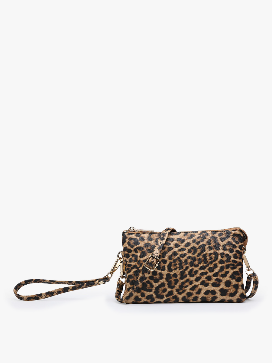 A leopard print crossbody clutch bag with a matching wristlet strap and gold-tone hardware, photographed on a clean white background.