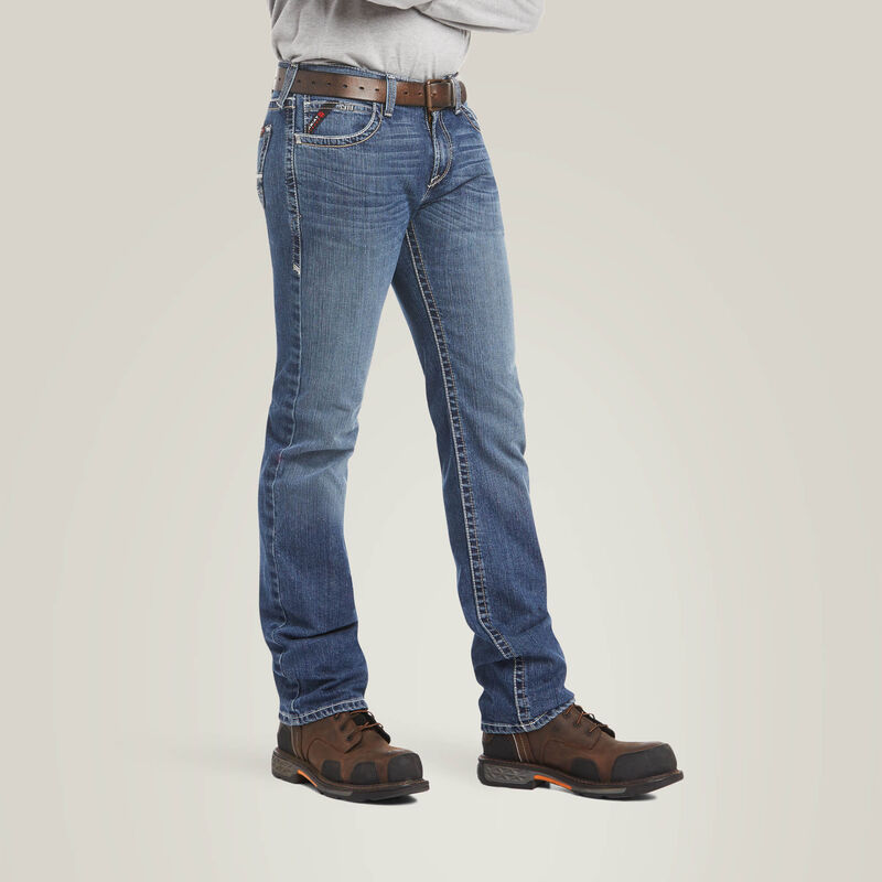 Men's bootcut blue jeans with contrast stitching, brown belt, and work boots
