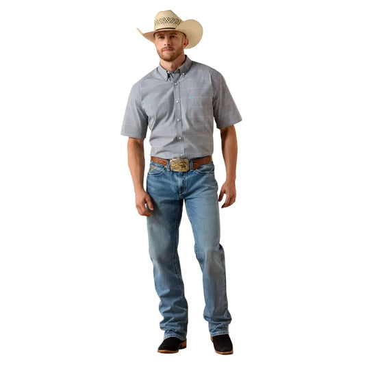 Man wearing a gray shirt, blue jeans, and a cowboy hat on a white background