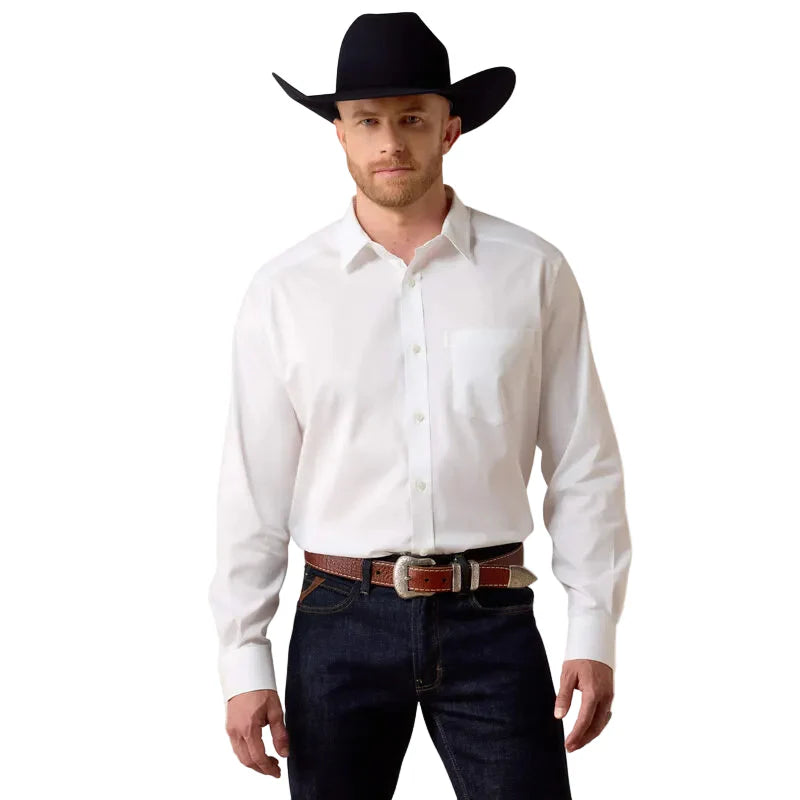 Man wearing a white shirt, black cowboy hat, and dark jeans on a white background