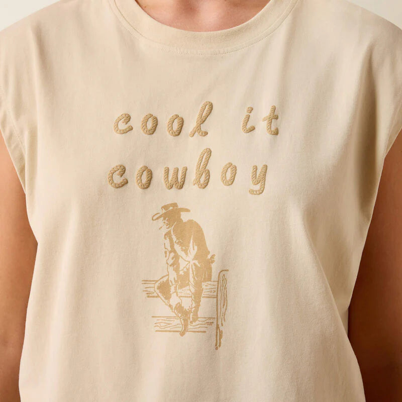 Beige t-shirt with 'cool it cowboy' text and graphic on a person wearing it.