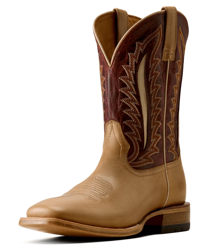 A single western cowboy boot in tan leather with a dark brown shaft featuring decorative zigzag stitching and contrast stitching, shown on a plain white background.