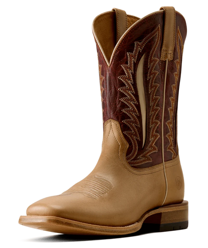 A single western cowboy boot in tan leather with a dark brown shaft featuring decorative zigzag stitching and contrast stitching, shown on a plain white background.