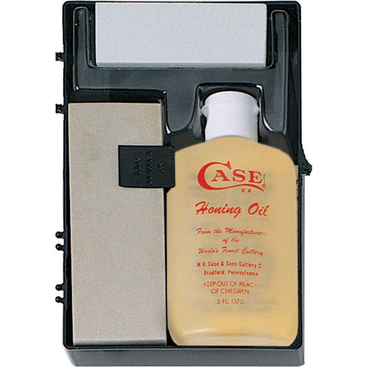 Bottle of Case Honing Oil in a black case with a white label.