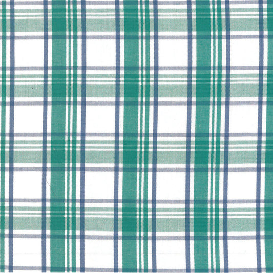Green and blue plaid fabric pattern on white background, textile material closeup