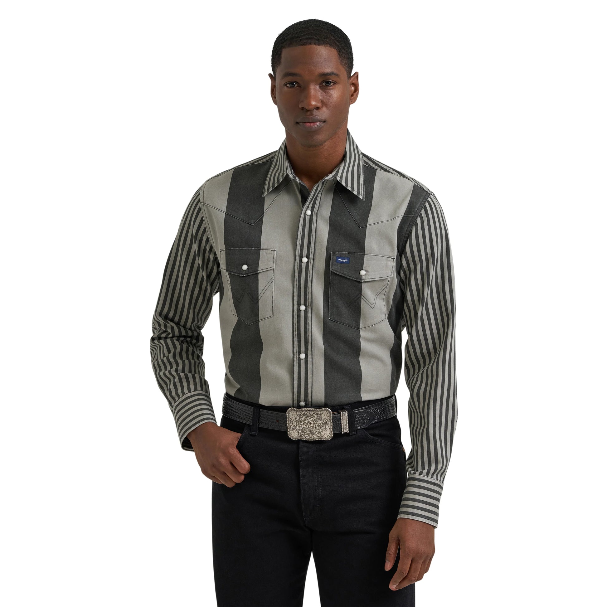 Man wearing a striped shirt with a visible brand logo on a white background