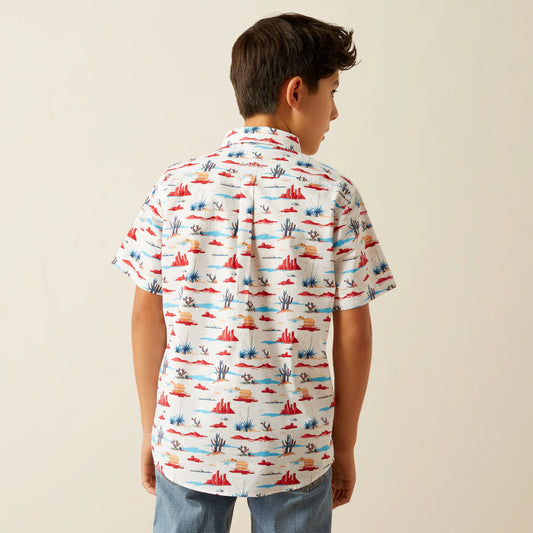 Boy wearing short sleeve white shirt with desert cactus and mountain print, rear view