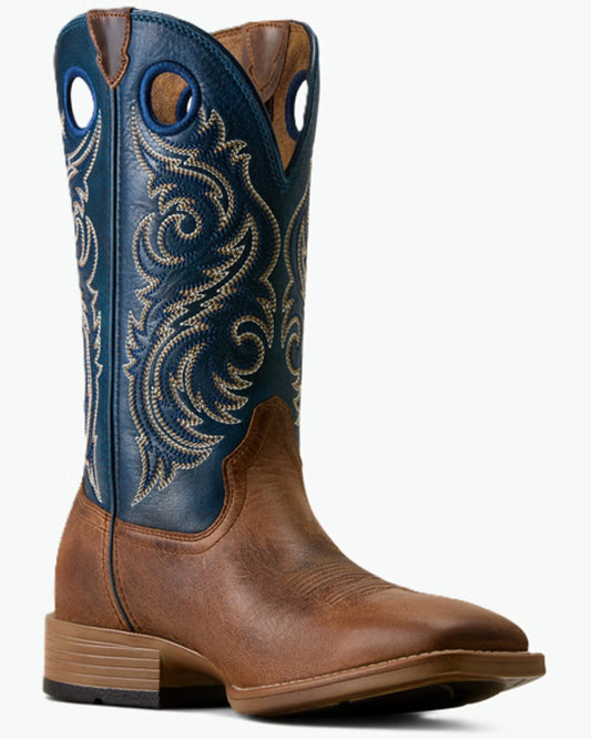 A single western cowboy boot with a brown leather lower section and a dark blue shaft featuring intricate gold embroidery and cutout details, shown against a plain white background.