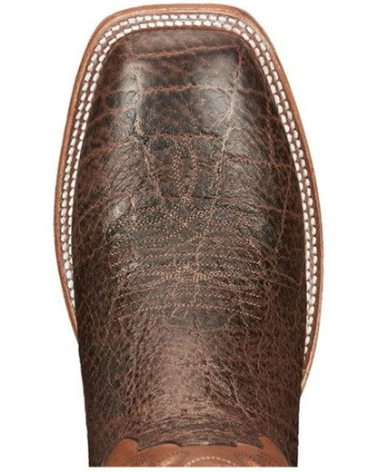 Close-up of brown square toe cowboy boot with textured leather and white stitching