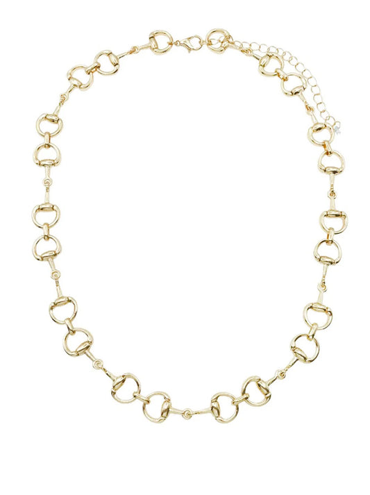 A gold-tone horsebit chain necklace with a delicate extender chain, displayed on a clean white background.