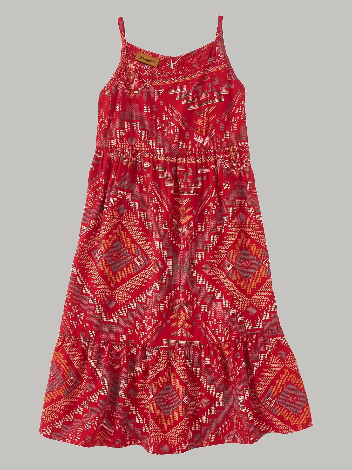 Red sleeveless sundress with geometric aztec patterns and elastic waist on a gray background.