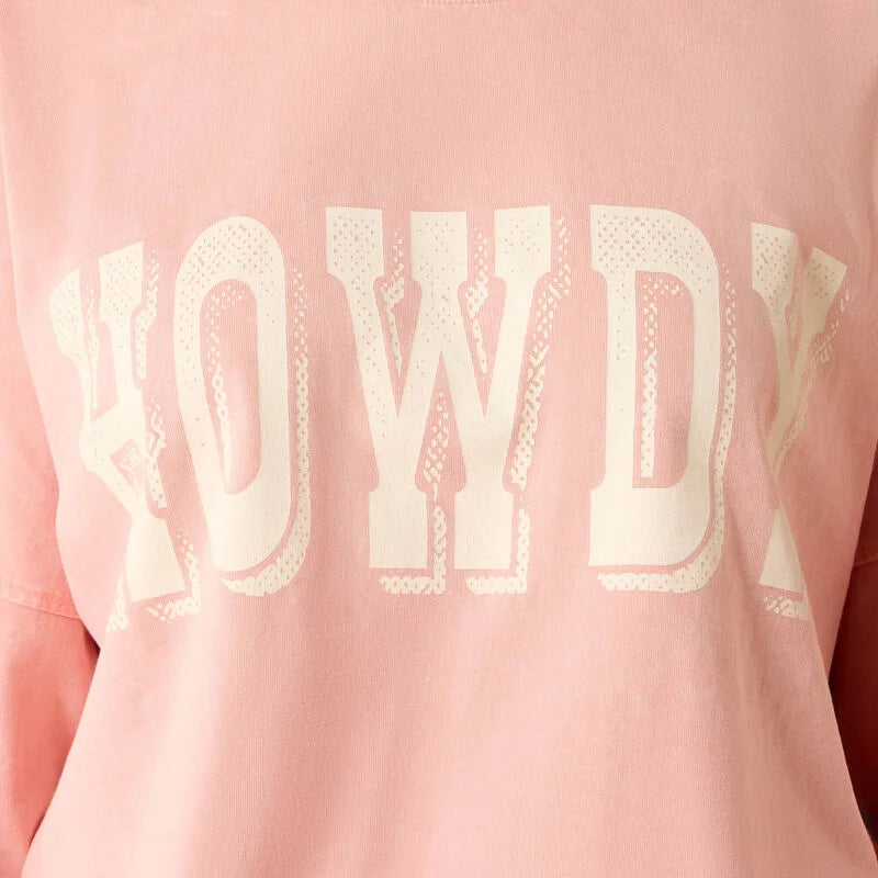 Pink t-shirt with bold white 'Howdy' text graphic on front