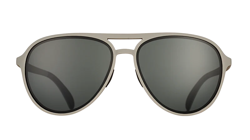 Aviator sunglasses with metallic frame and dark lenses on a white background