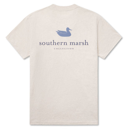 Beige short sleeve t-shirt with blue duck logo and Southern Marsh Collection text on back