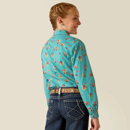 Girl wearing turquoise floral long-sleeve shirt and dark denim jeans, back view