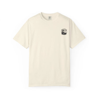 Beige t-shirt with a small black and white graphic on a white background