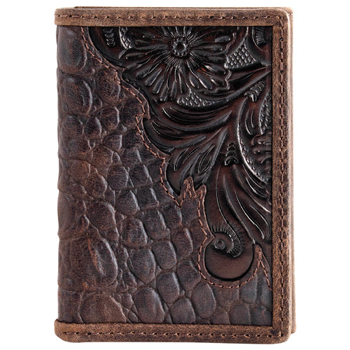 Brown leather wallet with intricate floral embossing on a white background