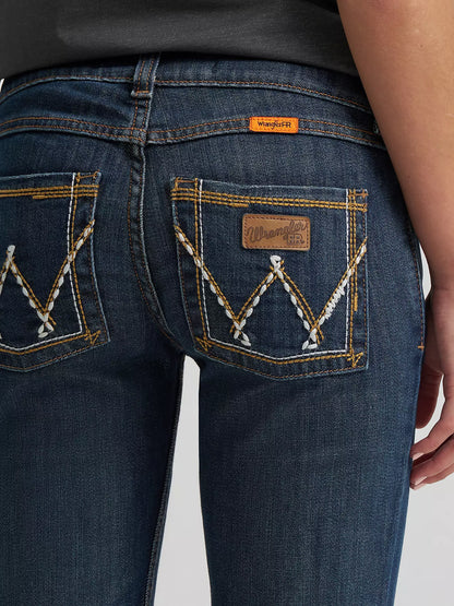 Close-up of Wrangler FR dark wash jeans back pockets with decorative stitching and leather patch.