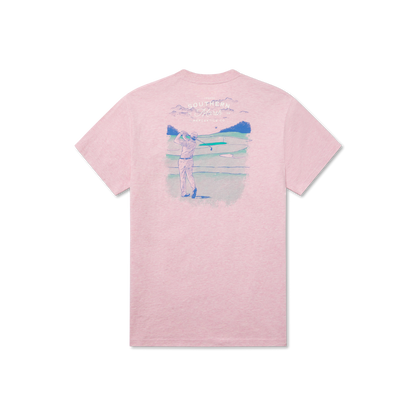 Light pink t-shirt with graphic of golfer swinging on a course, mountains in background.