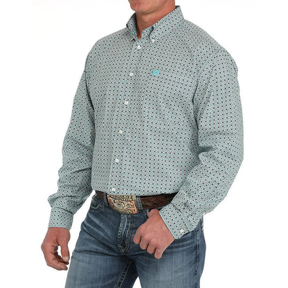 Men's long sleeve printed button-up shirt with jeans and western belt buckle
