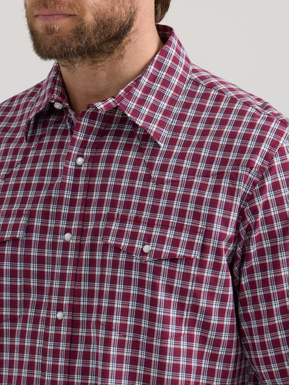 Close-up of man wearing red plaid snap button western shirt with chest pockets