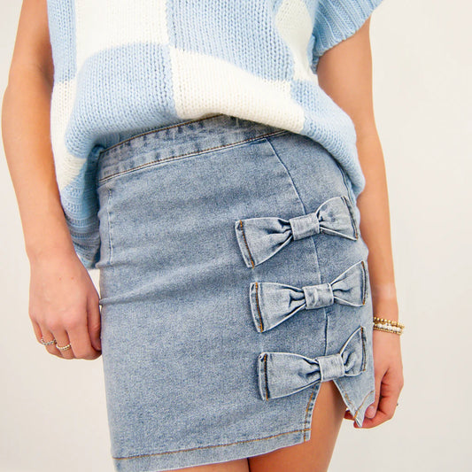 DENIM MINI SKIRT WITH BOW TRIM