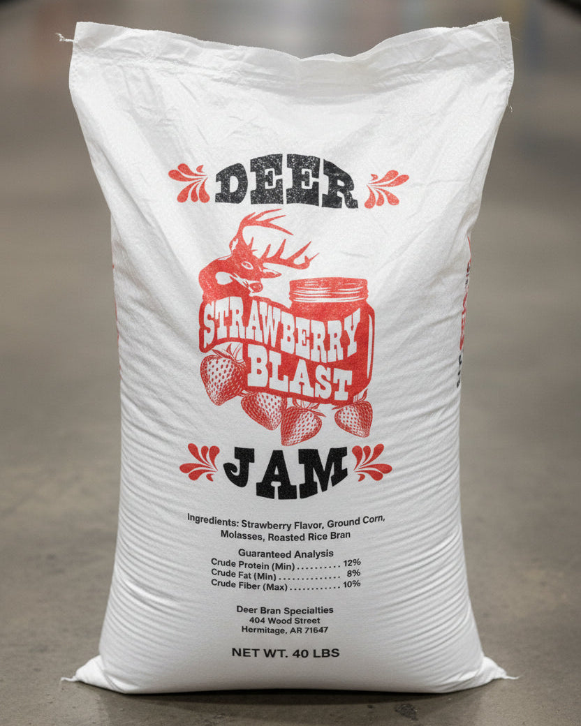A product label for Deer Bran Specialty's 'Deer Jam' strawberry-flavored snack. The label features a white background with red and black graphics, including a deer head above a jar of jam and the words 'Strawberry Blast'.