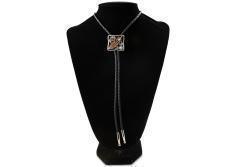 Stylish bolo tie by M&F Western Products. Square concho with matte black background. Raised engraved antique copper feather with raised engraved antique silver scrolling. 36” long, black cord made from manmade material.