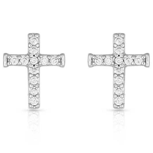 Pair of silver cross earrings with clear gemstones on a white background