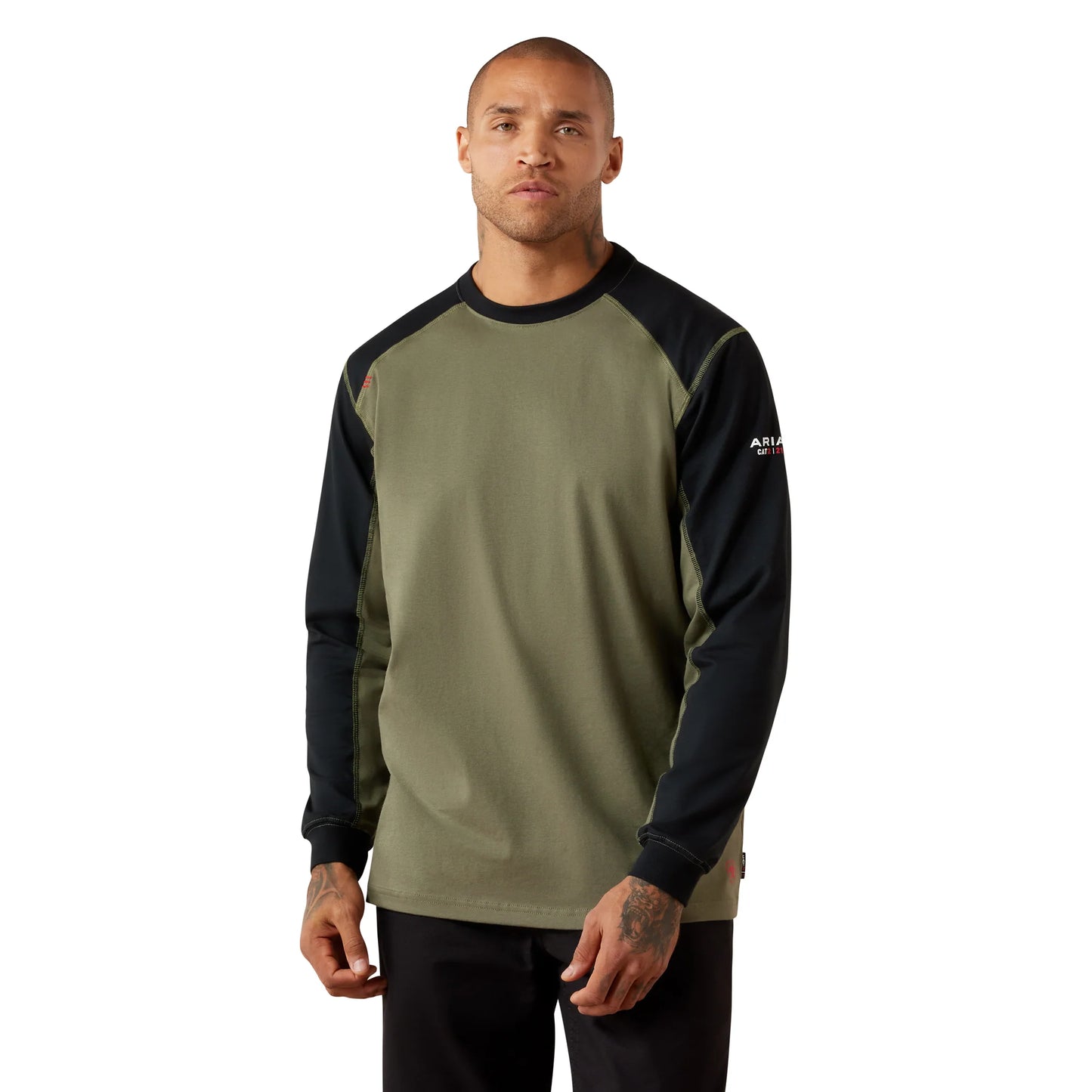 A man wearing a long-sleeve raglan shirt in olive green and black, with a small white logo on the left sleeve, photographed against a plain white background.