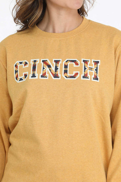 Mustard yellow crewneck sweatshirt with bold CINCH text and Western pattern detail