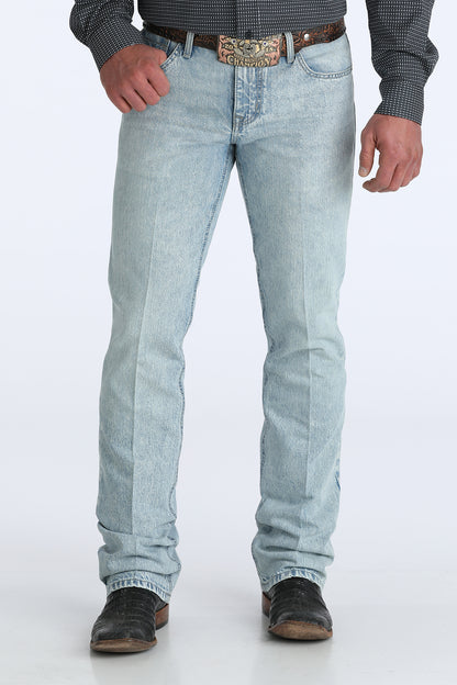 Light blue jeans worn by a person on a white background